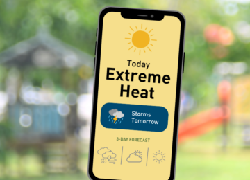 Cell phone displaying an Extreme Heat weather alert.