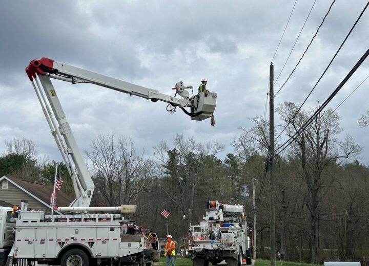 Crews working on a power pole