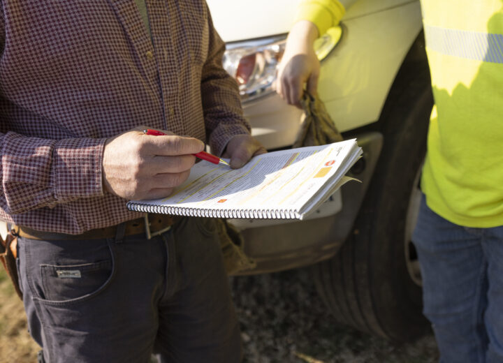 Field employees reviewing project details